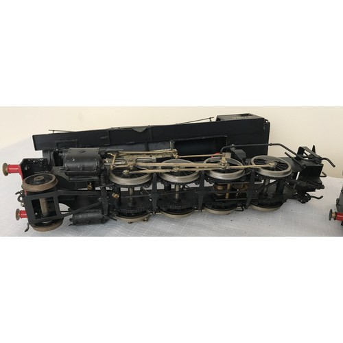 688 - An 0 gauge scale model BR tinplate Locomotive Engine 90178 and Tender together with 2 plastic model ... 