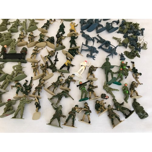 693 - A plastic toy soldier collection to include British and German military. Approx. 5.5cms h. Some mini... 