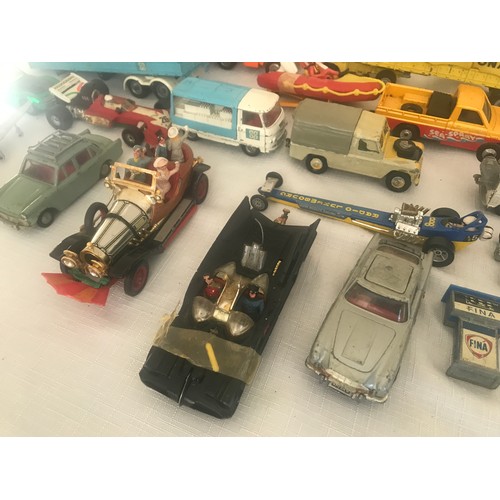 694 - A collection of Corgi and Dinky Diecast vehicles, 17 Corgi including Chitty Chitty Bang Bang, Batmob... 