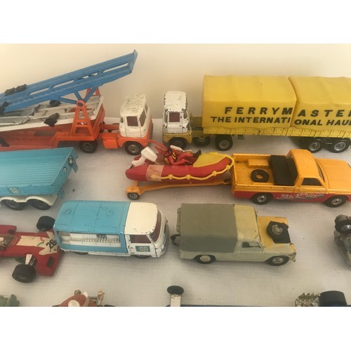 694 - A collection of Corgi and Dinky Diecast vehicles, 17 Corgi including Chitty Chitty Bang Bang, Batmob... 