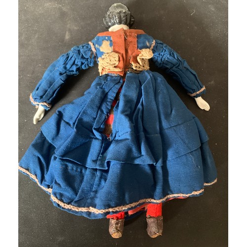 703 - A mid 19thC pot headed doll in cotemporary clothing with pot arms. 30cms l.