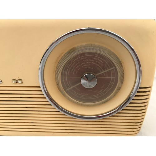 705 - A Bush retro styled battery operated radio TR 82D NO. 530/05707. 33cms l x 8.5cms w x 26.5cms h to h... 