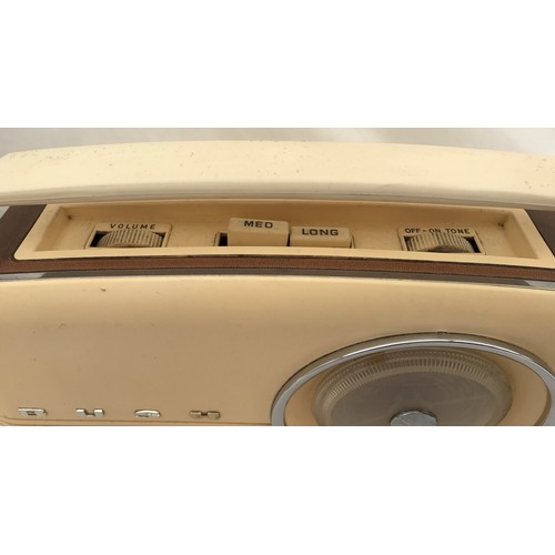 705 - A Bush retro styled battery operated radio TR 82D NO. 530/05707. 33cms l x 8.5cms w x 26.5cms h to h... 