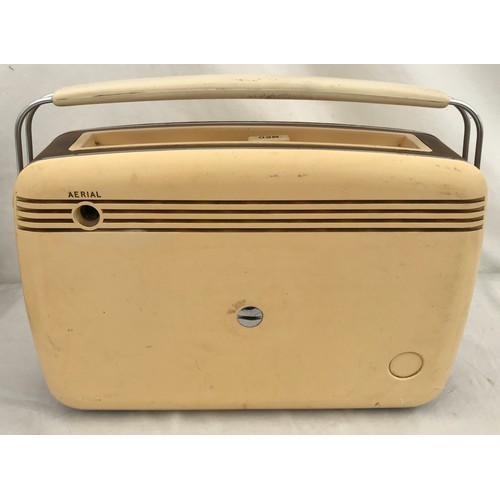 705 - A Bush retro styled battery operated radio TR 82D NO. 530/05707. 33cms l x 8.5cms w x 26.5cms h to h... 