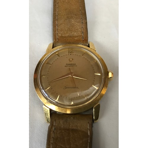 708 - An Omega 18ct gold Seamaster automatic wristwatch with original leather strap and 9ct buckle clasp. ... 