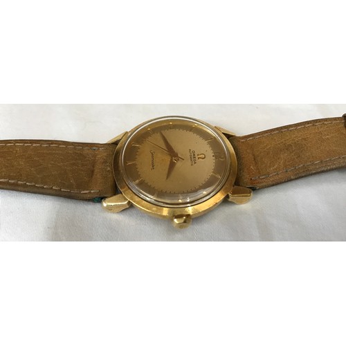 708 - An Omega 18ct gold Seamaster automatic wristwatch with original leather strap and 9ct buckle clasp. ... 