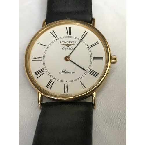 709 - A Longines Presence quartz 9ct gold cased wristwatch with leather strap, Stamped to the back of the ... 