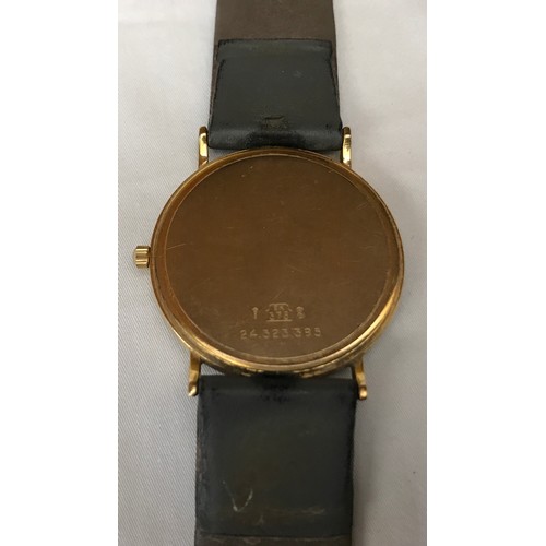 709 - A Longines Presence quartz 9ct gold cased wristwatch with leather strap, Stamped to the back of the ... 