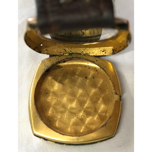 710 - A 9ct gold cased Shield wristwatch with leather strap. Stamped to inner case 375. Case size 27mm. di... 