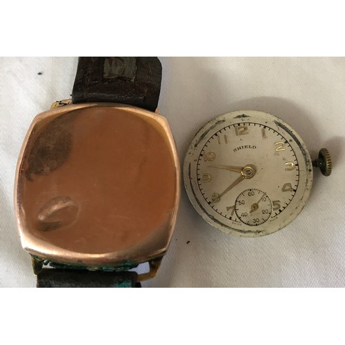 710 - A 9ct gold cased Shield wristwatch with leather strap. Stamped to inner case 375. Case size 27mm. di... 