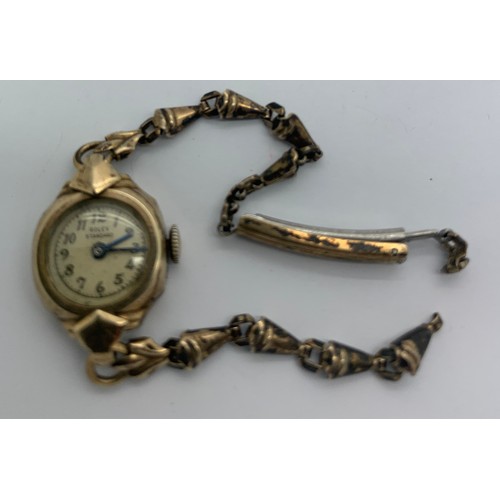 714 - A Rolex Standard 17 jewel case lady's gold coloured wristwatch.