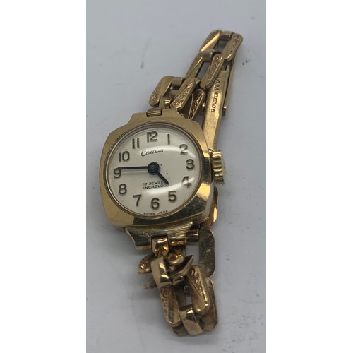 720 - A 9ct gold Chateau Lady's wristwatch and strap. Total weight 12.5gms.