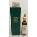 A House of Commons blended Scotch Whisky 70cl signed by Boris Johnson PM in a presentation green bag... 