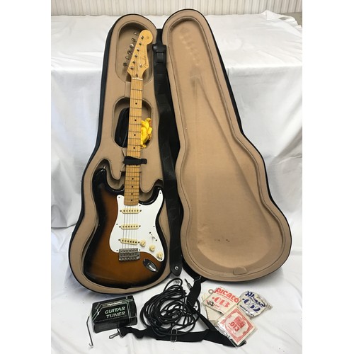 735 - A Fender Stratocaster Electric Guitar. Japanese made, number A001532. Two tone original body with tr... 