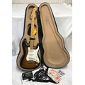 A Fender Stratocaster Electric Guitar. Japanese made, number A001532. Two tone original body with tr... 