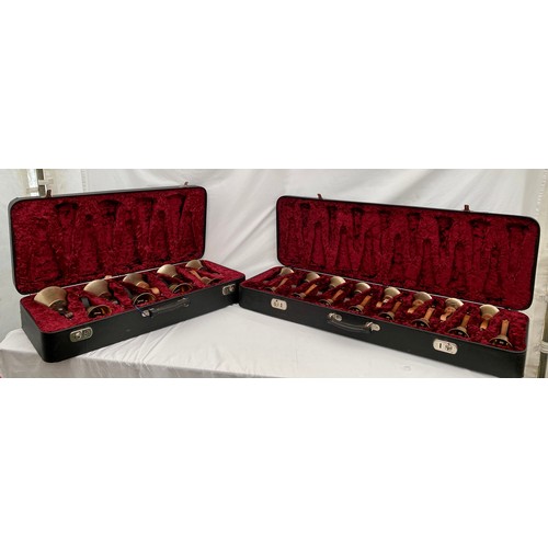 744 - Two cased sets of hand ringing bells. Larger case of 16 bells containing : 12 marked Whitechapel to ... 