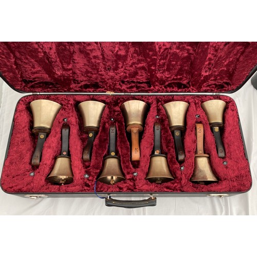 744 - Two cased sets of hand ringing bells. Larger case of 16 bells containing : 12 marked Whitechapel to ... 