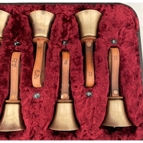 744 - Two cased sets of hand ringing bells. Larger case of 16 bells containing : 12 marked Whitechapel to ... 