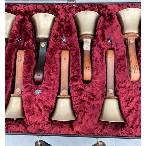 744 - Two cased sets of hand ringing bells. Larger case of 16 bells containing : 12 marked Whitechapel to ... 