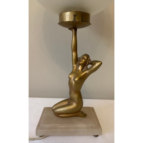 746 - An Art Deco spelter female figural table lamp on white onyx base with associated glass shade. 28cms ... 