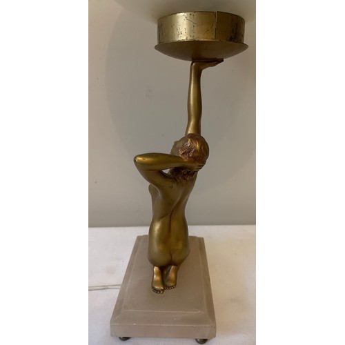 746 - An Art Deco spelter female figural table lamp on white onyx base with associated glass shade. 28cms ... 