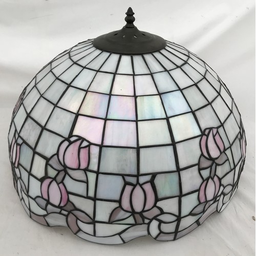 753 - A large Tiffany style pink table lamp shade in a floral design. 52cms w x approx. 33cms h.