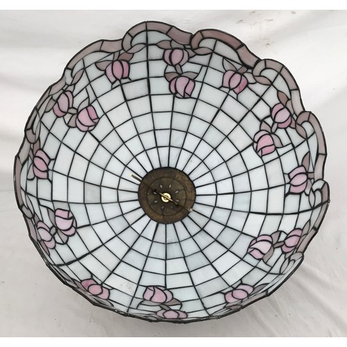 753 - A large Tiffany style pink table lamp shade in a floral design. 52cms w x approx. 33cms h.