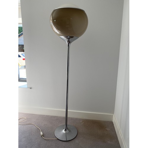 755 - Harveiluce I. Guzzini  A 1970's chrome standing uplighter standard lamp with brown acrylic globe sha... 