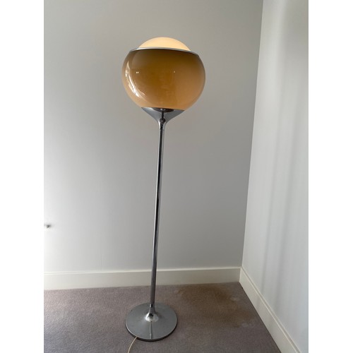 755 - Harveiluce I. Guzzini  A 1970's chrome standing uplighter standard lamp with brown acrylic globe sha... 