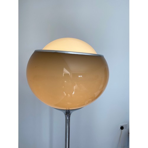 755 - Harveiluce I. Guzzini  A 1970's chrome standing uplighter standard lamp with brown acrylic globe sha... 