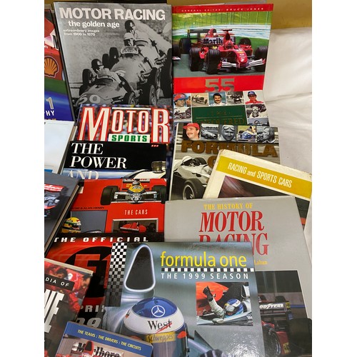 768 - A large collection of Formula 1 books including mostly hardbacks.