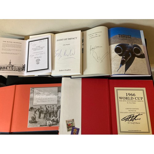 773 - A collection of signed books to include 1966 World cup tribute signed by Sir Geoff Hurst, Thrust by ... 