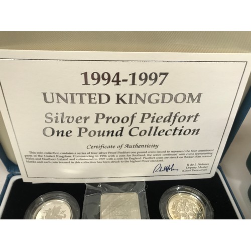 778 - A collection of Royal Mint coins to include 1994-1997  silver proof piedfort one pound collection , ... 