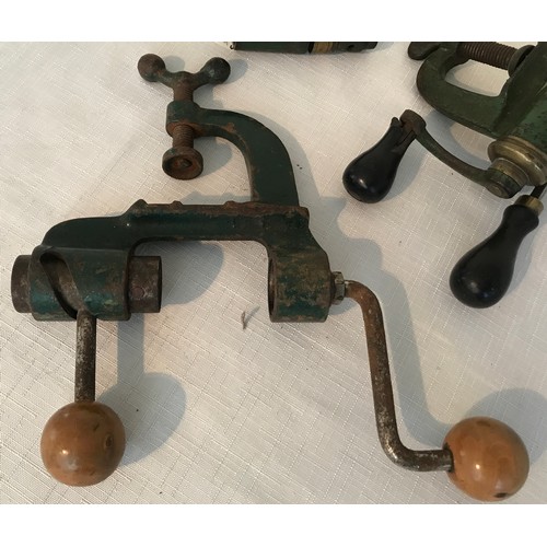 862 - Three green painted cast iron and brass shotgun cartridge vice re loaders, lever action, one W Bartr... 