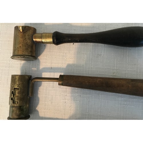 864 - Four gunpowder dram measures, wood handles, one by G and J.W. Hawksley.