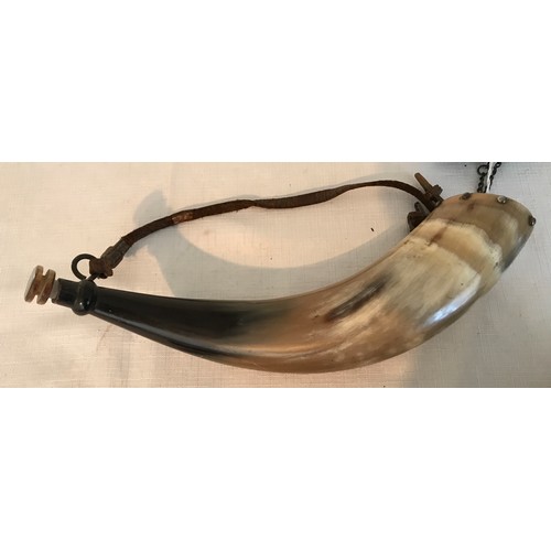 865 - Three gunpowder horns, largest 33cms l, 28cm and small 13cm length.