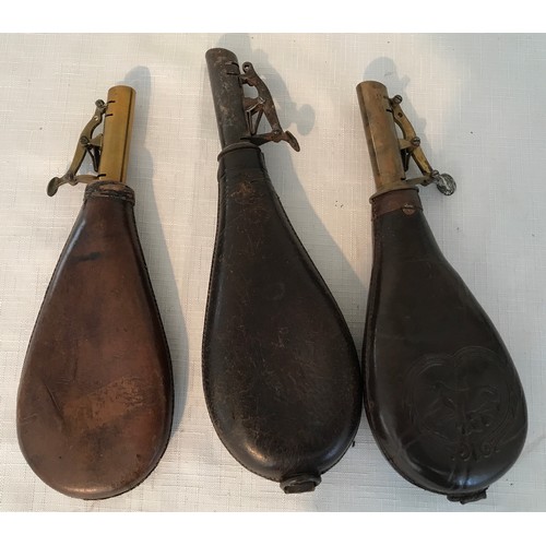 866 - Three leather gunpowder flasks, one with embossed hunting dog design, largest 23cms l.