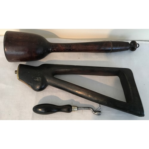 869 - Wooden gun barrel tamper, 36cms l, 8cms w, a rifle butt with brass mounts, metal butt end and a turn... 