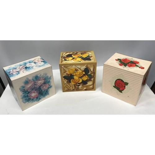 909 - A collection of 3 floral cardboard 4 draw jewellery boxes with decorative design to all 3 and pull t... 