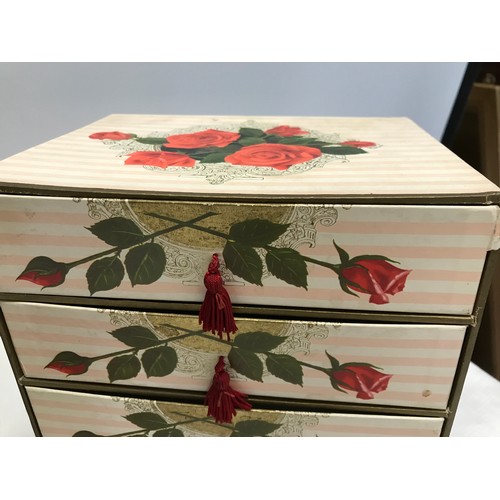 909 - A collection of 3 floral cardboard 4 draw jewellery boxes with decorative design to all 3 and pull t... 