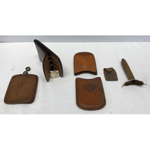 911 - A Gentleman's collection to include 3 x leather cigar cases; one single with metal clasp, one dark b... 