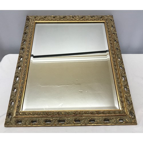 917 - Decorative gilt framed bevel edge wall mirror frame size 49.5cms w x 60.5cms h.