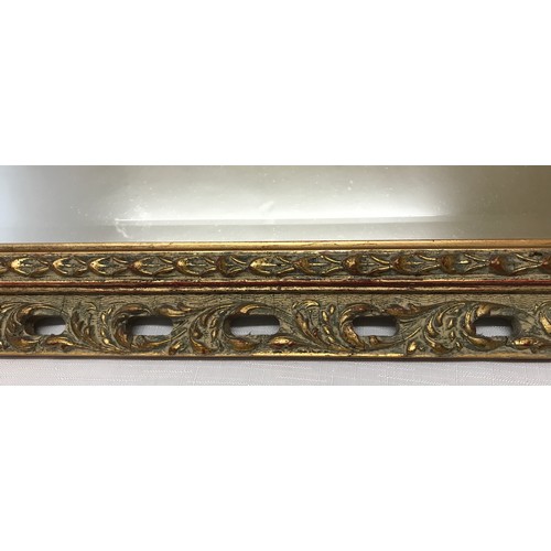 917 - Decorative gilt framed bevel edge wall mirror frame size 49.5cms w x 60.5cms h.