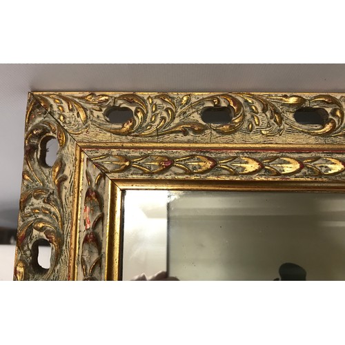 917 - Decorative gilt framed bevel edge wall mirror frame size 49.5cms w x 60.5cms h.