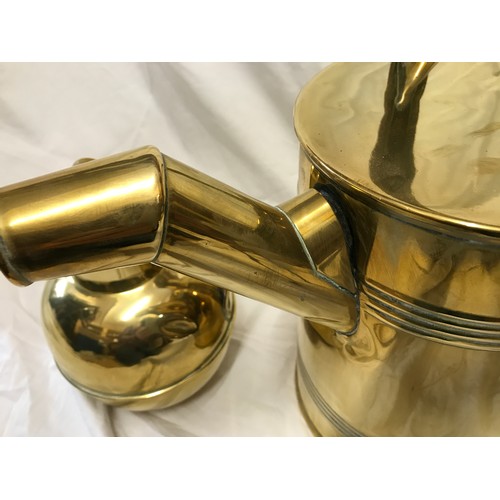 920 - A selection of brassware to include a large watering can 41cms h to handle, a trivet stand 18cms h a... 