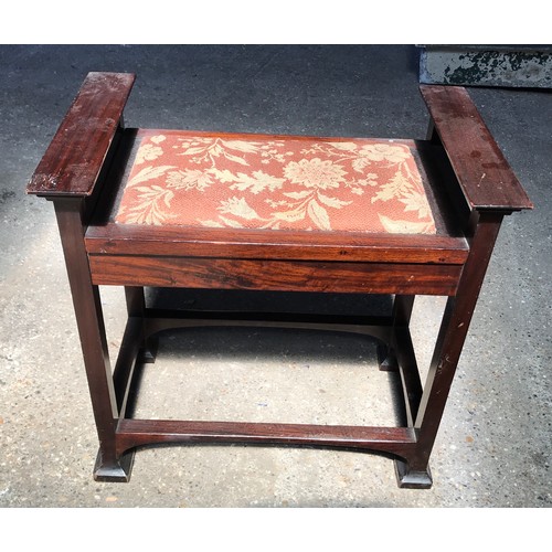 1360 - A walnut piano stool with upholstered seat. 55cms h x 57cms w x 35cms d.