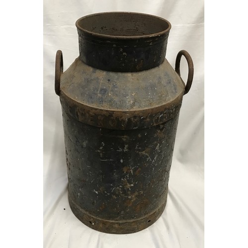 1543 - A 1962 Dutch metal Eigenoom milk churn. 60cms h x 35cms w.