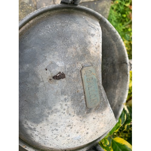 1545 - Two galvanised watering cans. 2.5 gallon.