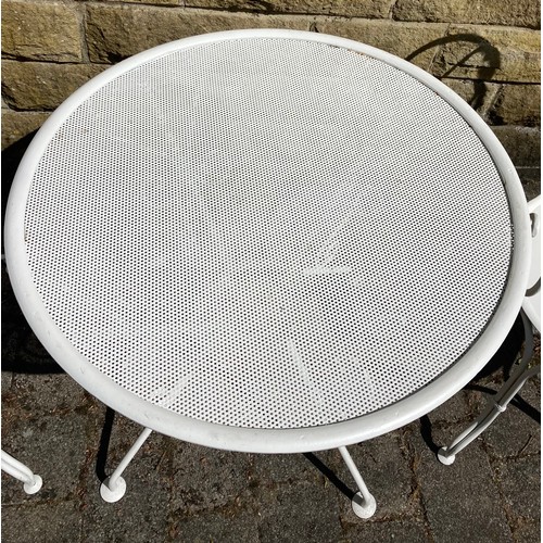 1551 - A French vintage metal table and two armchairs.