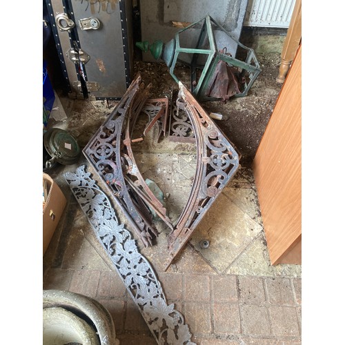 1556 - Eleven cast iron roof brackets 103cms x 17cms h, 4 small cast iron brackets 35cms, white cast iron r... 